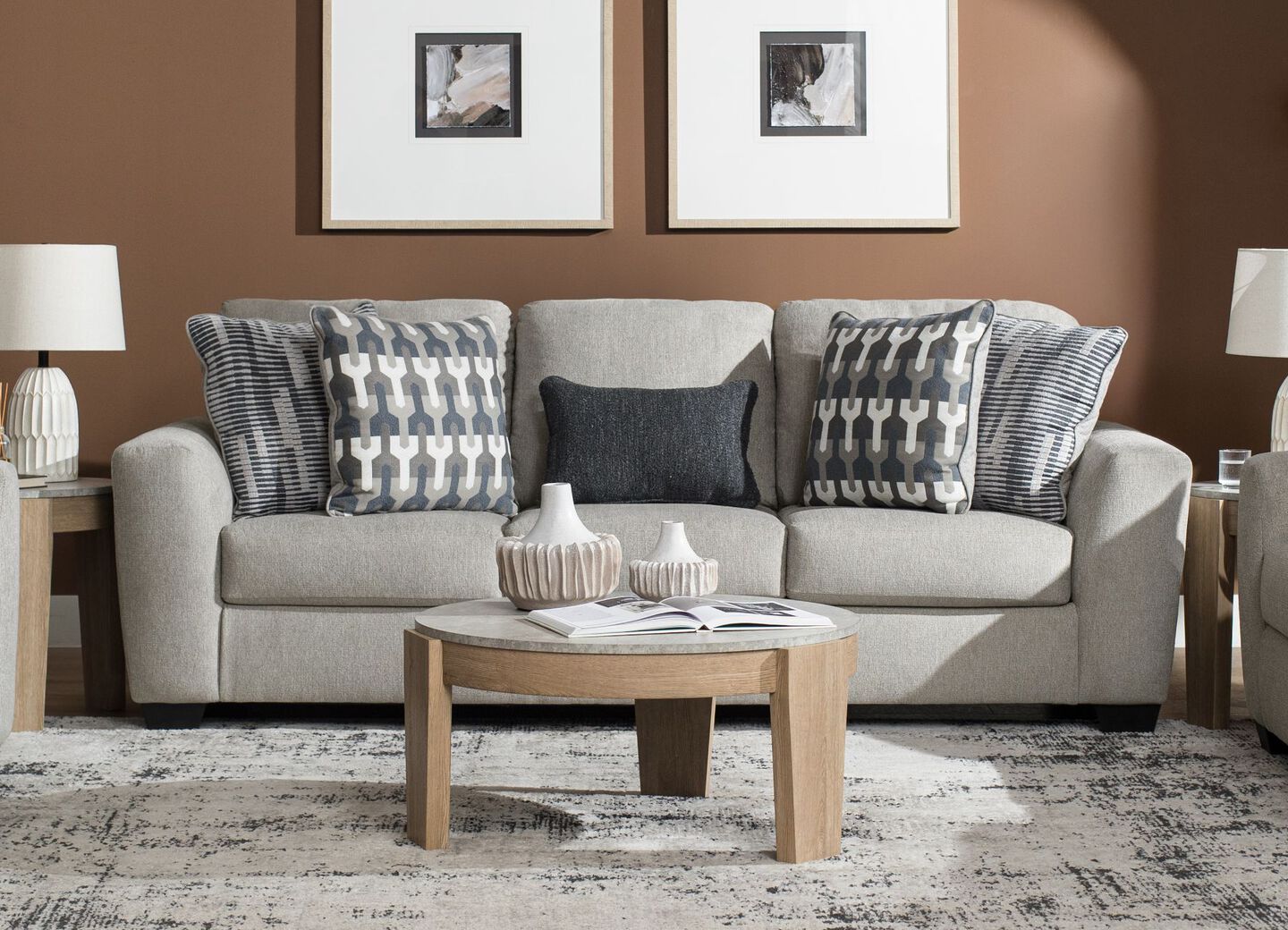 Grey sofa with light brown coffee table in front