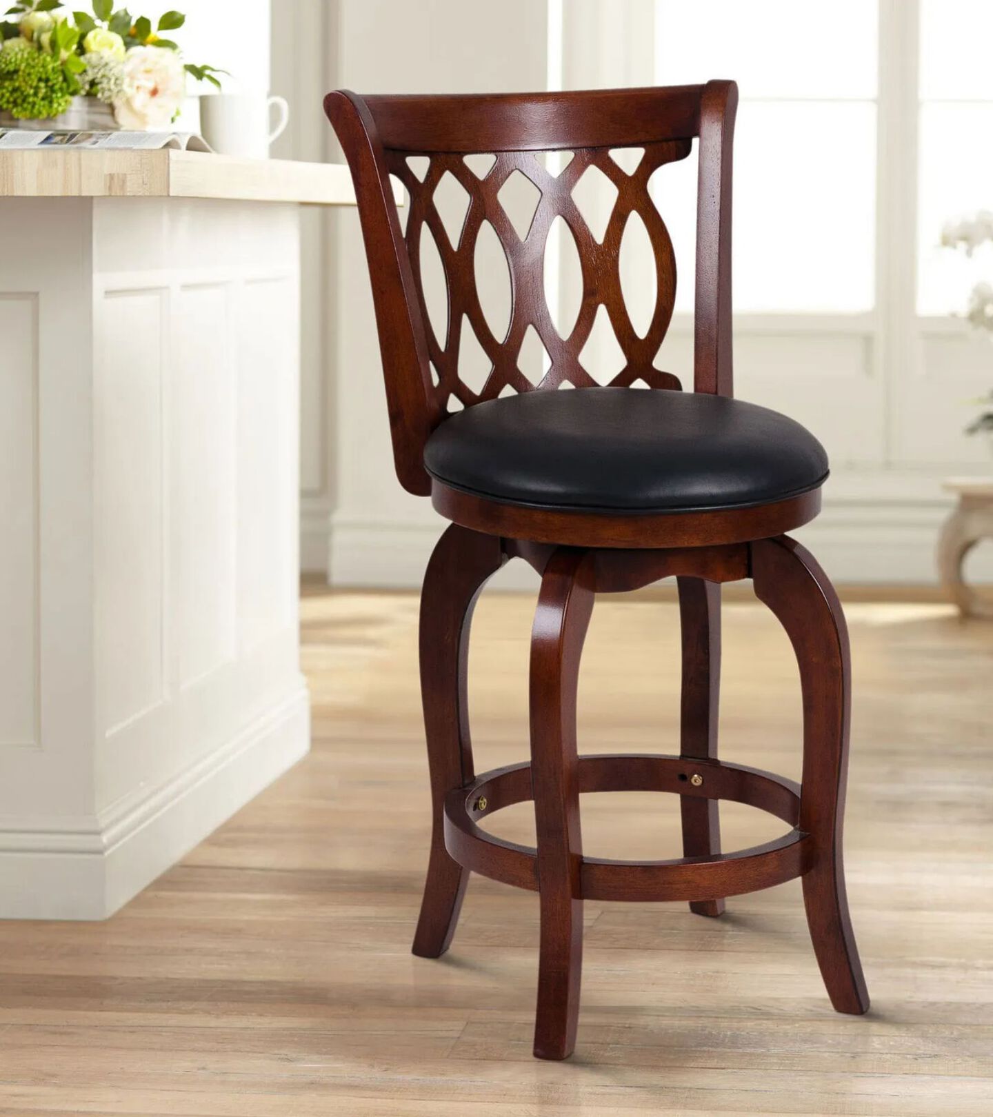 dark brown wooden barstool with black leather seat