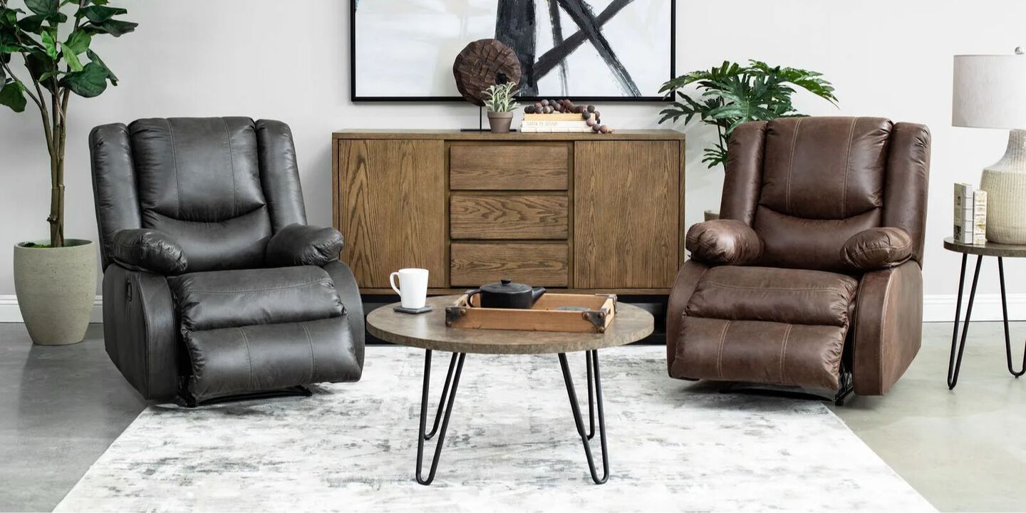 Living room with black and brown matching recliners, coffee table, and cabiner