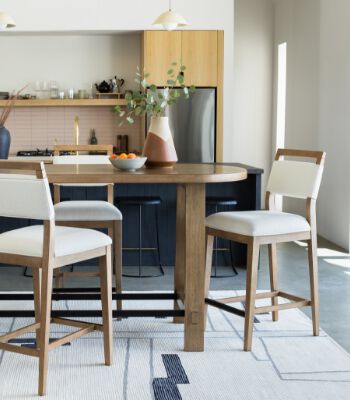 Pulaski pub height dining table and upholstry bar stools