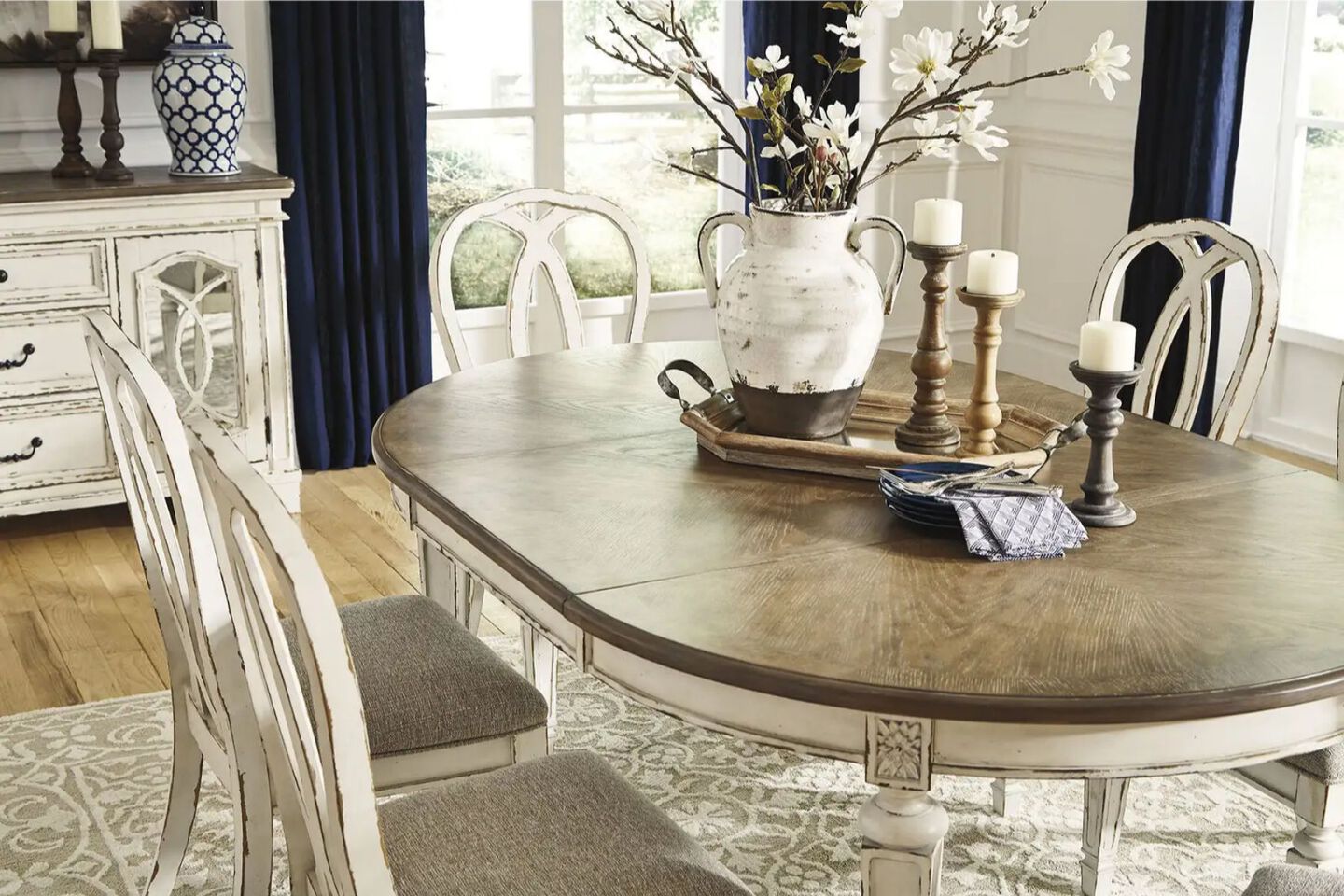 Dining room with a white and brown table with matching chairs