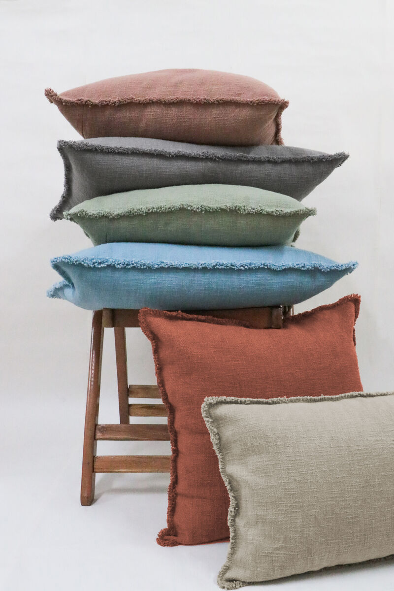 Organic Chic washed textured cotton solid lumbar pillow with frayed edges