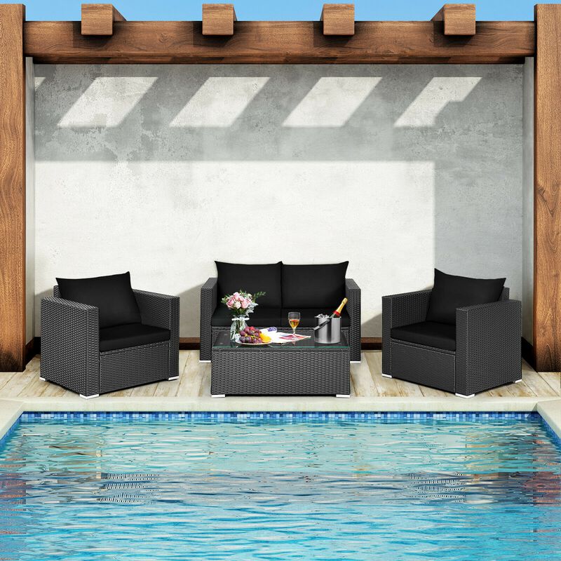 4 Pieces Patio Rattan Conversation Set with Padded Cushion and Tempered Glass Coffee Table