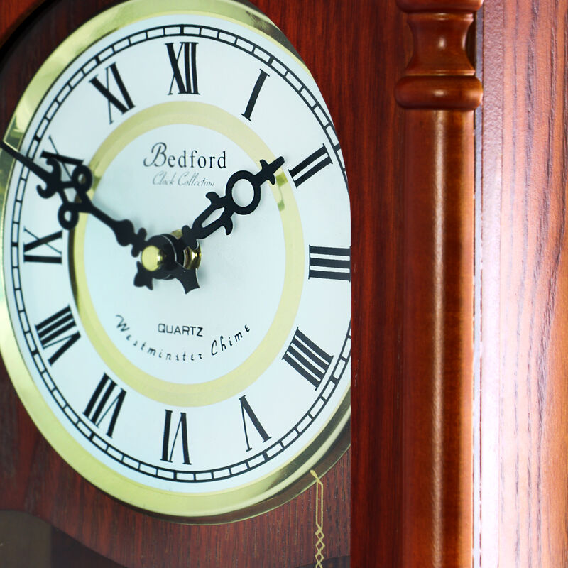 Bedford Collection 25 Inch Wall Clock with Pendulum and Chime in Dark Redwood Oak Finish