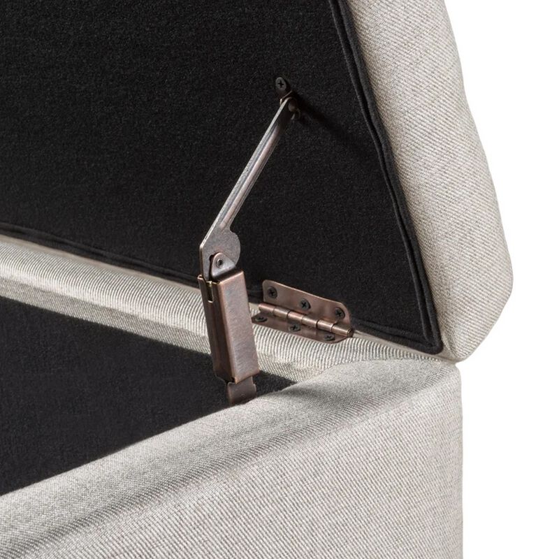 Nancy Storage Ottoman Bench, 51 Inch Beige Fabric, Brass Nailhead Trim - Benzara