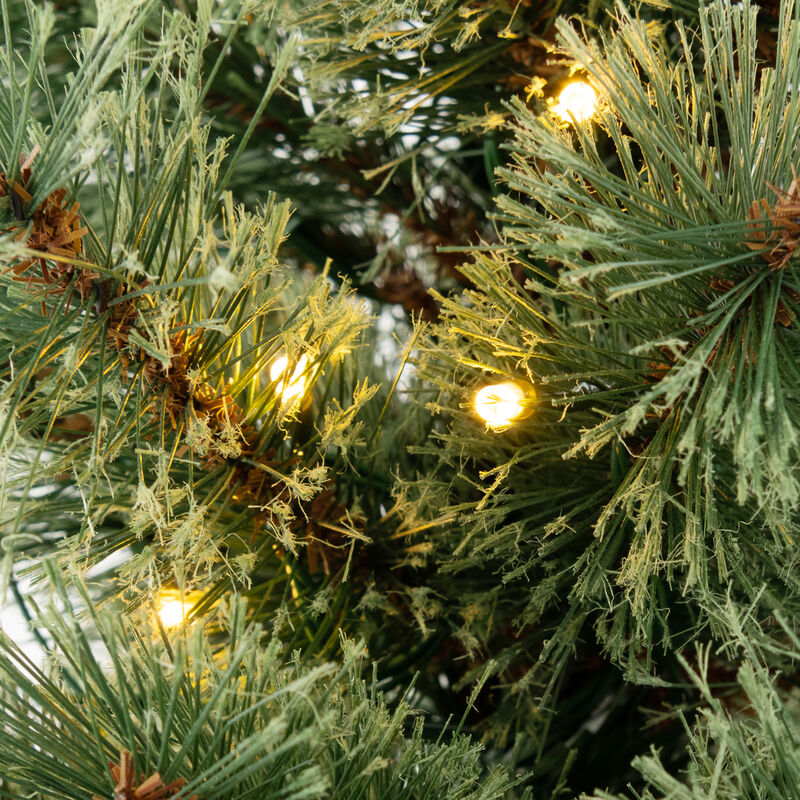 Pre-Lit Potted Christmas Tree with Pine Needles for Festive and Compact Holiday Decor
