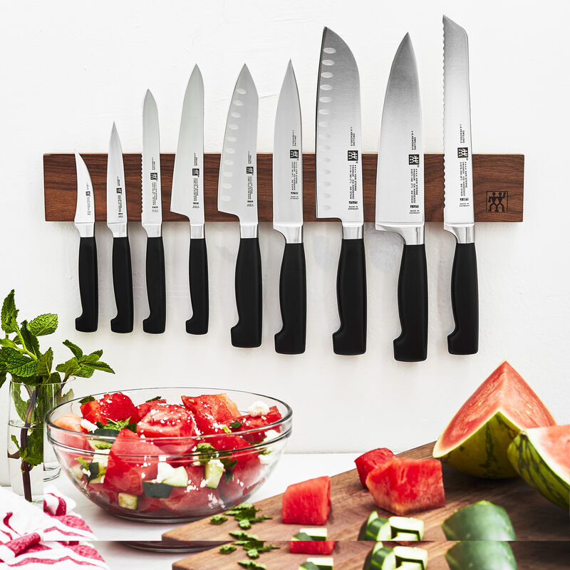ZWILLING Four Star 7-inch Hollow Edge Rocking Santoku Knife