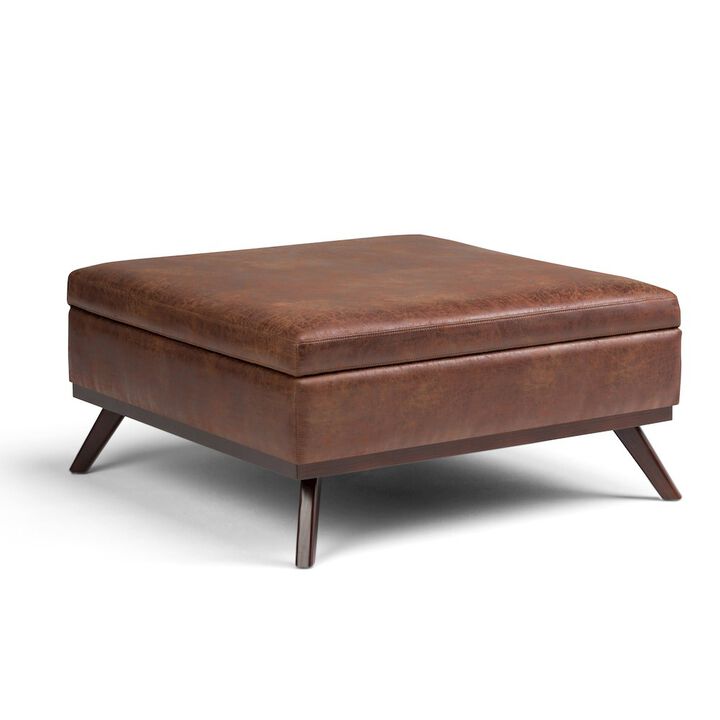 Simpli Home Coffee Table Storage Ottoman In Distressed Saddle Brown Vegan Faux Leather
