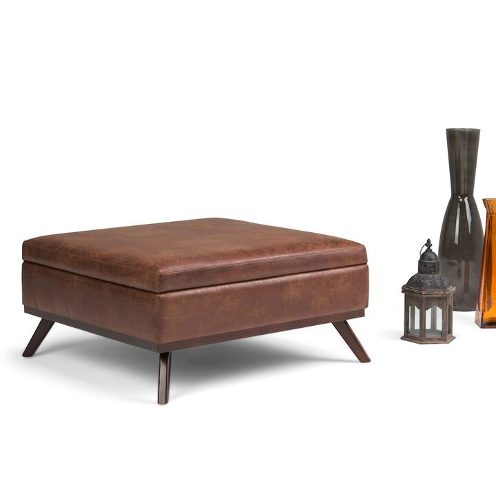 Simpli Home Coffee Table Storage Ottoman In Distressed Saddle Brown Vegan Faux Leather