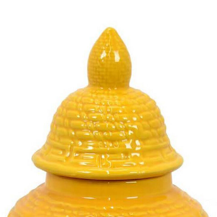 Bryan 13 Inch Ceramic Temple Jar, Geometric Print, Finial Top, Yellow - Benzara