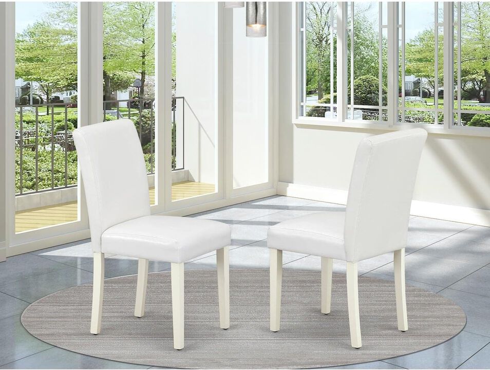 East West Furniture ABP2T64 Classic Parson Dining White Faux Leather Upholstered Chairs, Set of 2