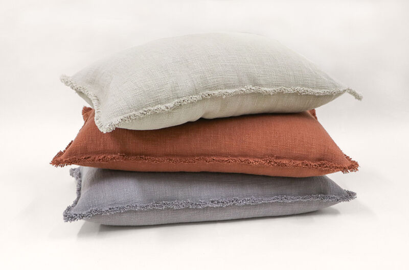 Organic Chic washed textured cotton solid pillow with frayed edges