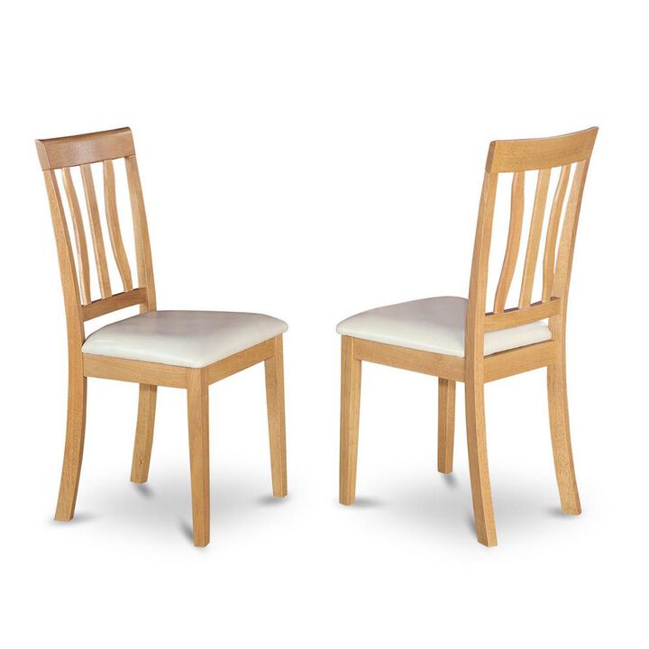 East West Furniture Antique  Chair  for  dining  room  Faux  Leather  Seat  with  Oak  Finish,  Set  of  2