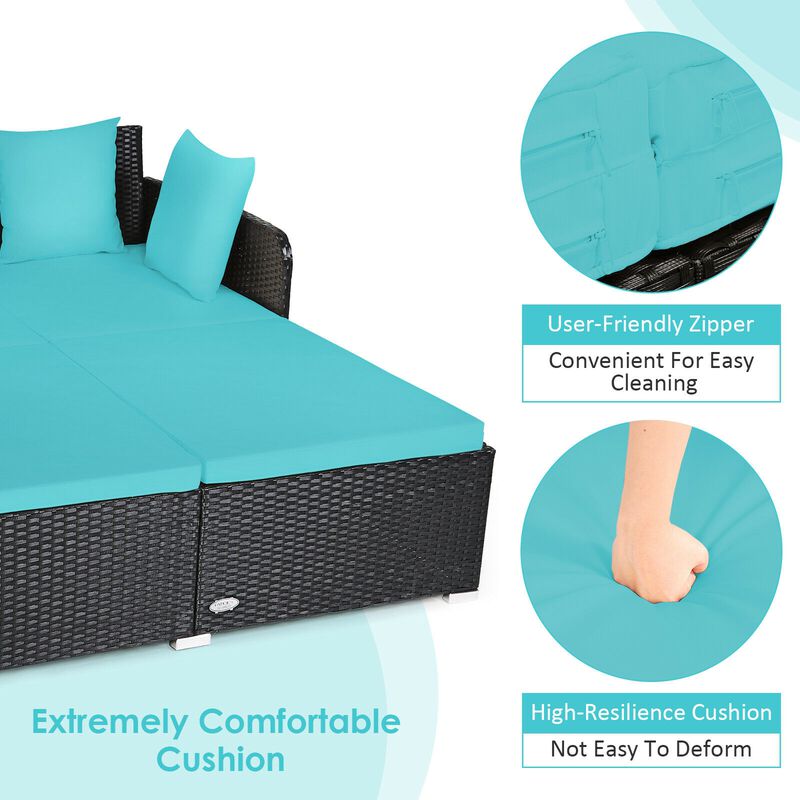 Spacious Outdoor Rattan Daybed with Upholstered Cushions and Pillows