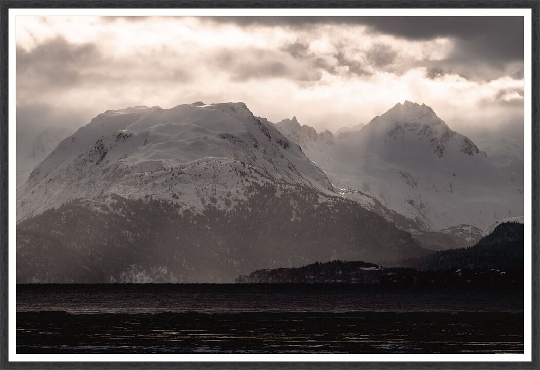Misty Peaks and Sunbursts