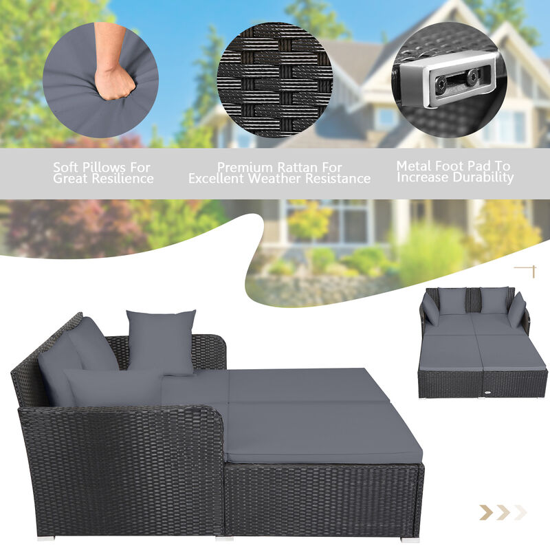 Spacious Outdoor Rattan Daybed with Upholstered Cushions and Pillows