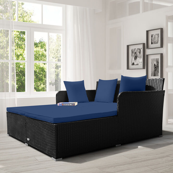 Spacious Outdoor Rattan Daybed with Upholstered Cushions and Pillows