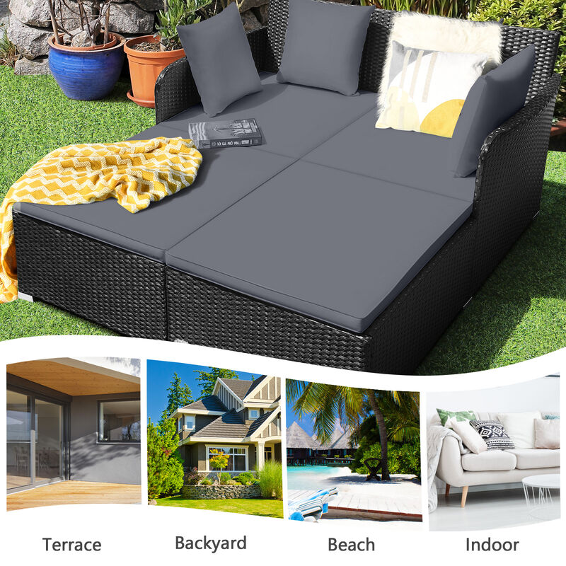 Spacious Outdoor Rattan Daybed with Upholstered Cushions and Pillows