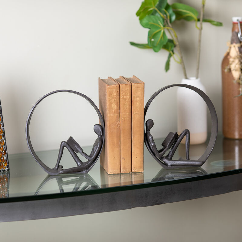 Encircled Reader Iron Sculpture