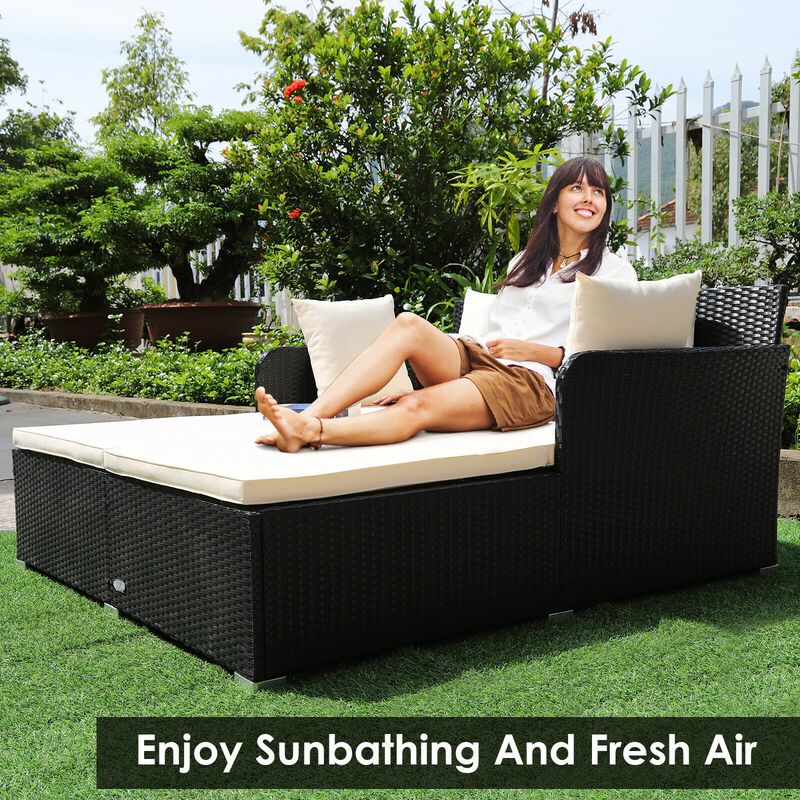 Spacious Outdoor Rattan Daybed with Upholstered Cushions and Pillows