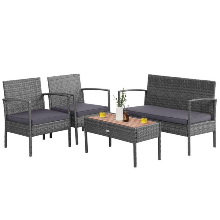 Hivvago 4 Pieces Rattan Patio Conversation Furniture Set with Acacia Wood Tabletop