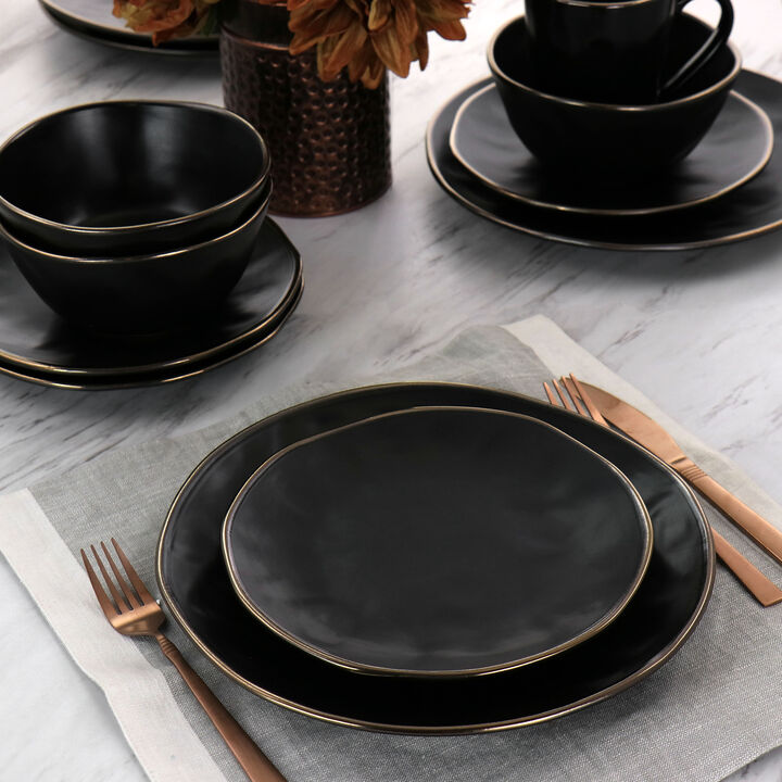 Elama Modern 16 Piece Stoneware Dinnerware Set in Matte Black with Gold Rim