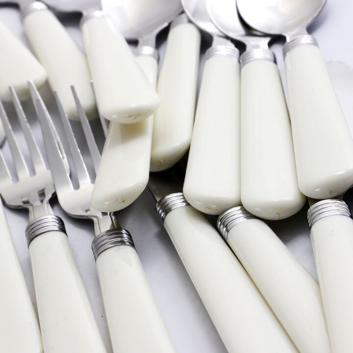 Gibson Sensations II 16 Piece Stainless Steel Flatware Set with White Handles and Chrome Caddy