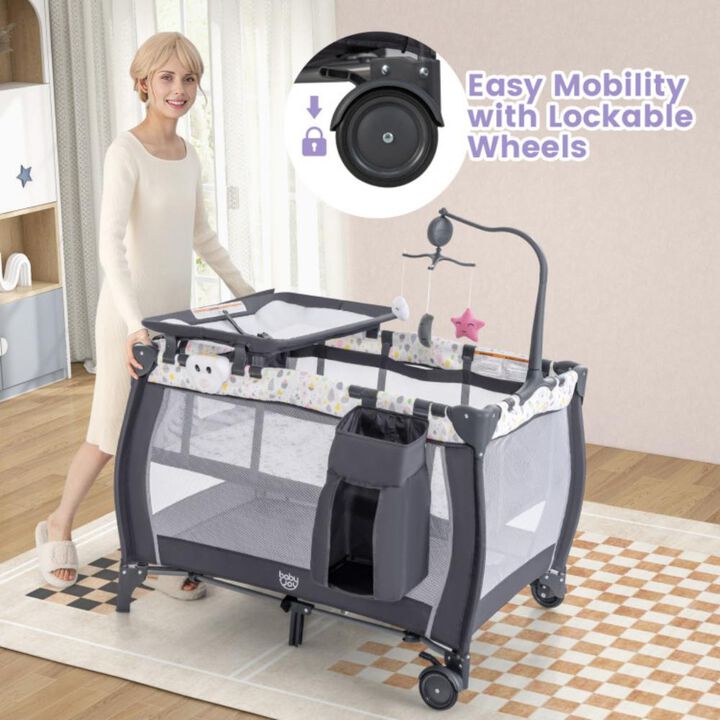 Portable Baby Playard with Changing Table Bassinet and Music Box