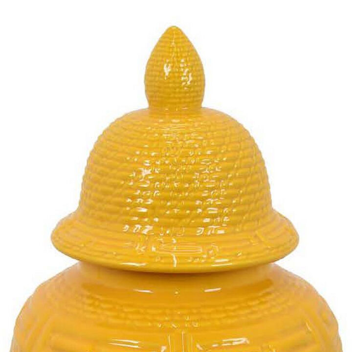 Bryan 24 Inch Ceramic Temple Jar, Geometric Print, Finial Top, Yellow - Benzara