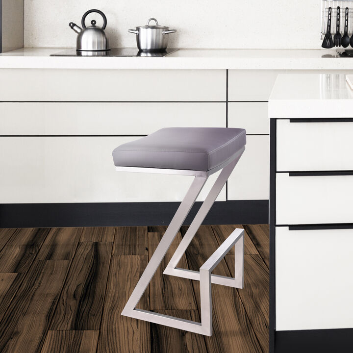 Atlantis  Counter Height Backless Grey Faux Leather and Brushed Stainless Steel Bar Stool