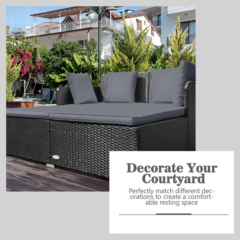 Spacious Outdoor Rattan Daybed with Upholstered Cushions and Pillows