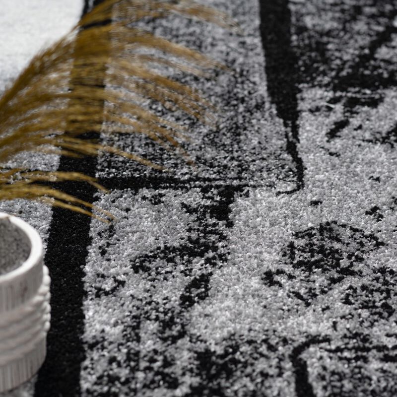 Black-White Area Rug with Modern Abstract Paint Effect