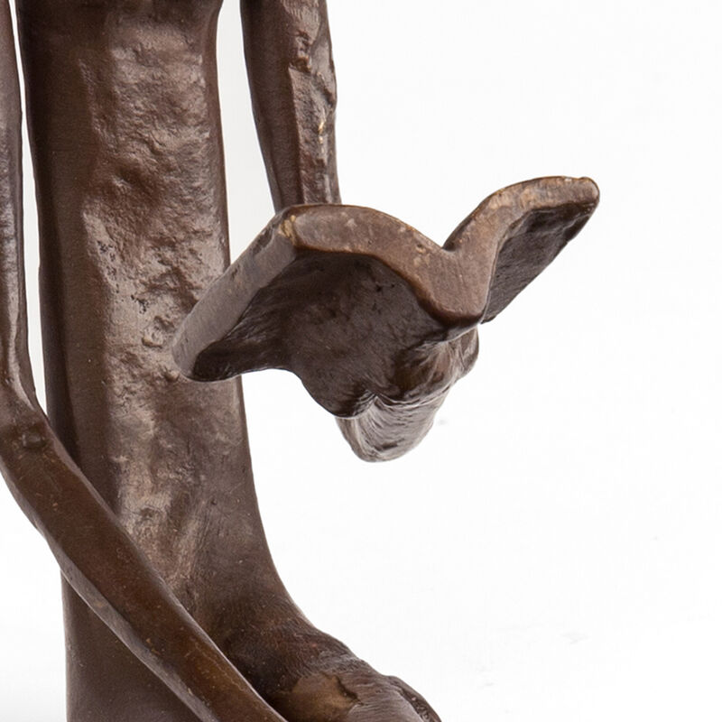 Woman Reading Over Ledge Cast Bronze