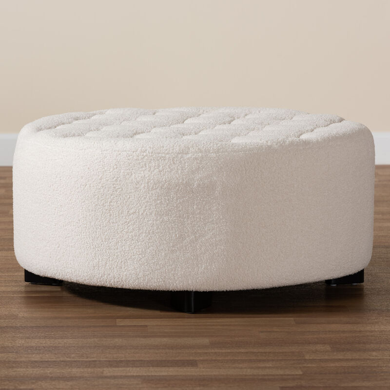 Baxton Studio Athena Modern and Ivory Boucle Upholstered and Black Finished Round Ottoman