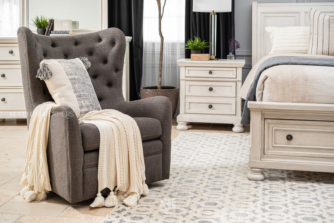 Boulevard Oxford Gliding Chair in Grey in a bedroom setting