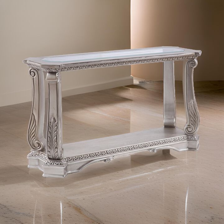 Antique Sofa Table with Polyresin Engravings and Clear Glass Top, Silver and Clear - Benzara