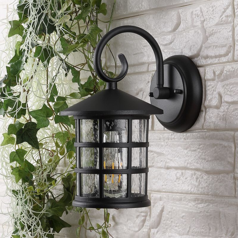 Cadiz 1-Light Iron/Seeded Glass Cottage Rustic Scrolled Lantern LED Outdoor Sconce