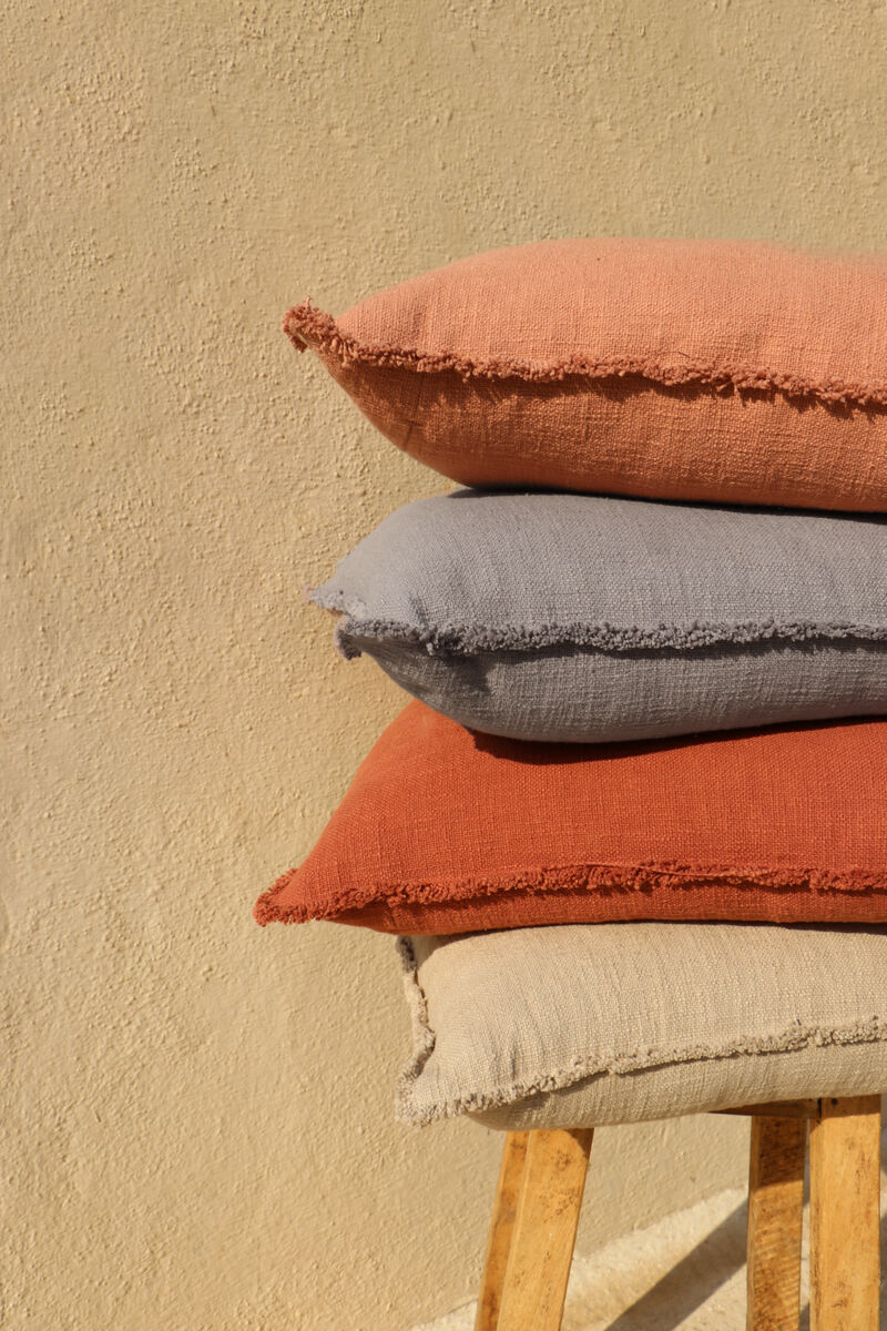Organic Chic washed textured cotton solid lumbar pillow with frayed edges