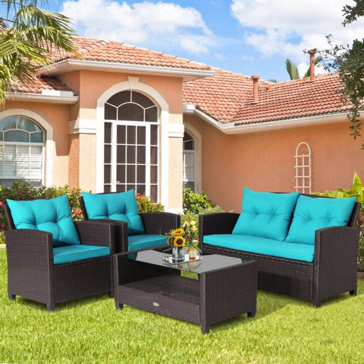 Hivvago 4 Pieces Patio Rattan Furniture Set with Tempered Glass Coffee Table