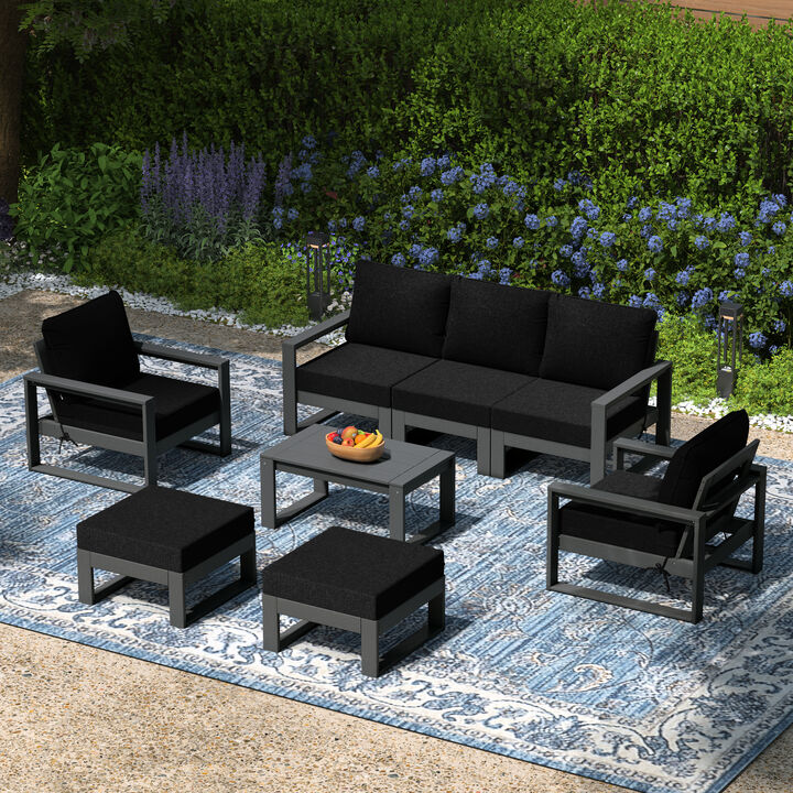 WestinTrends 8-Piece Modern HDPE Outdoor Patio Furniture Conversation Set with Coffee Table and Ottomans
