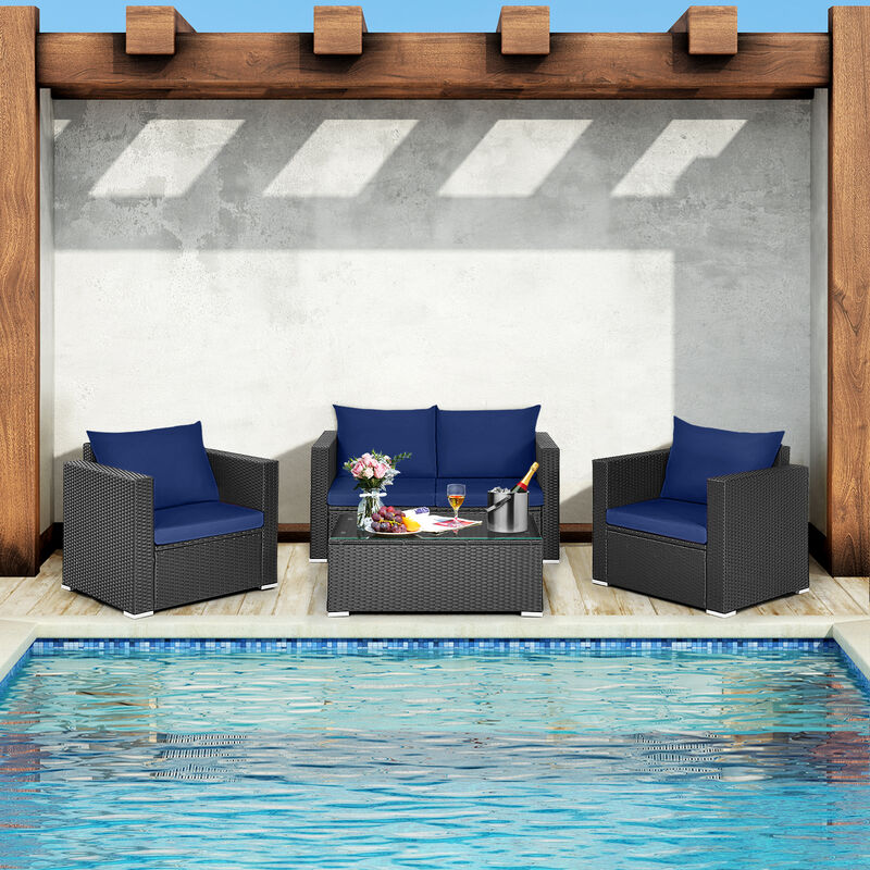 4 Pieces Patio Rattan Conversation Set with Padded Cushion and Tempered Glass Coffee Table