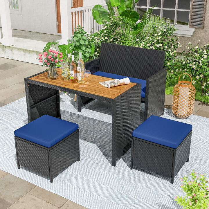 4 Piece Outdoor Dining Set with Wood Topped Dining Table  Rattan Loveseat Chair and 2 Ottomans
