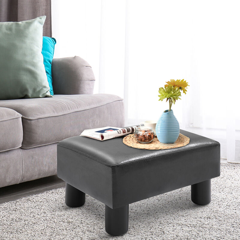 HOMCOM Ottoman Foot Rest, Small Foot Stool with Faux Leather Upholstery, Rectangular Ottoman Footrest with Padded Foam Seat and Plastic Legs, Bright Black
