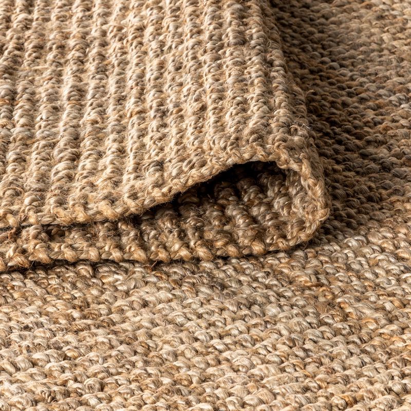 Pata Hand Woven Chunky Jute with Fringe Area Rug