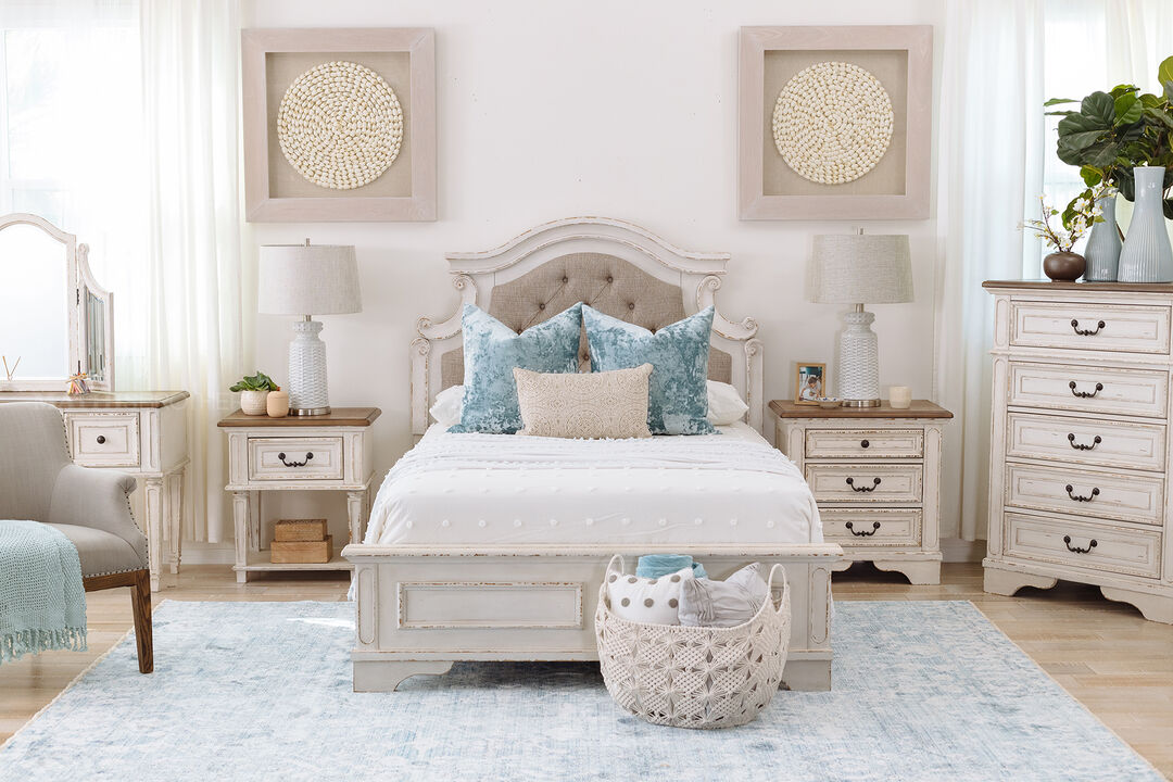 Realyn One Drawer Nightstand - in a bedroom setting