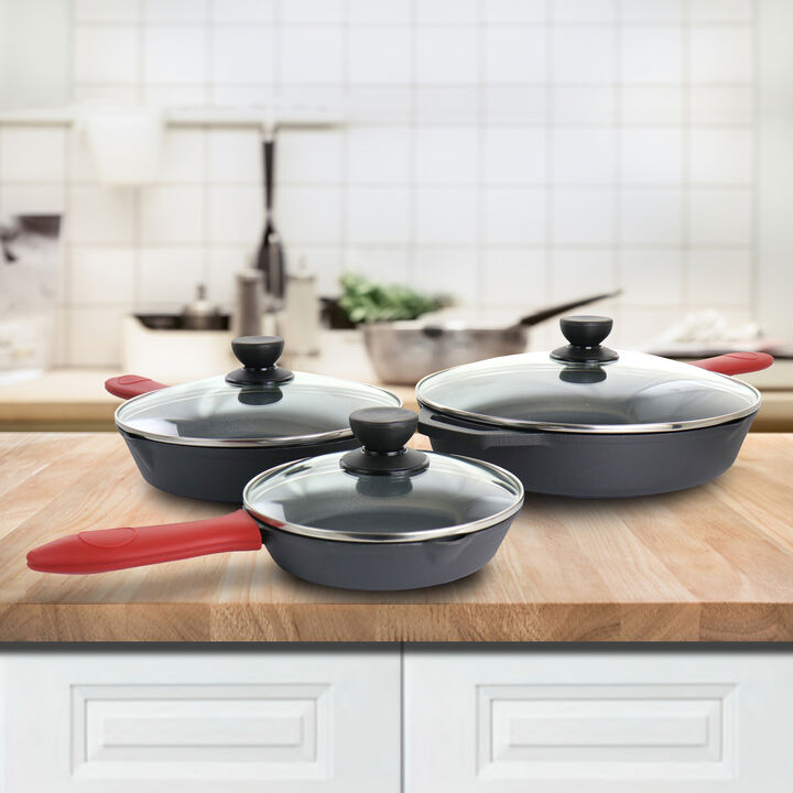 MegaChef Pre-Seasoned 9 Piece Cast Iron Skillet Set with Lids and Red Silicone Holder