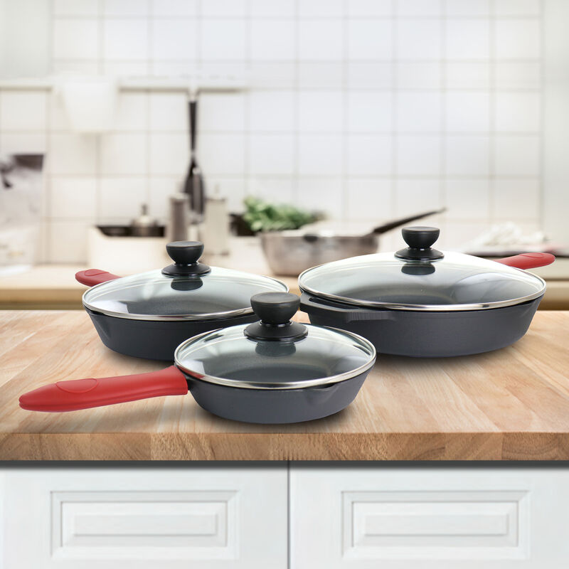 MegaChef Pre-Seasoned 9 Piece Cast Iron Skillet Set with Lids and Red Silicone Holder
