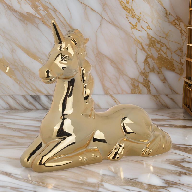 11 Inch Sitting Unicorn Figurine, Ceramic Statuette in Gold Metallic Finish - Benzara